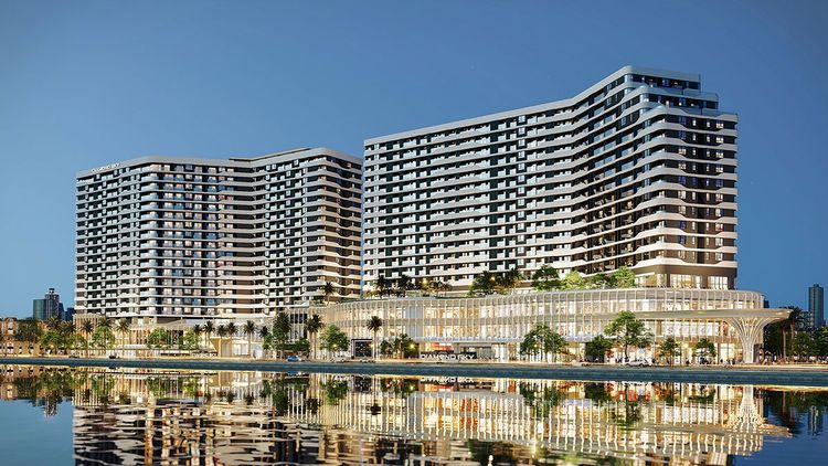 Phối cảnh hai tòa tháp căn hộ Diamond Sky và khối đế thương mại soi bóng xuống mặt nước lúc chiều tối